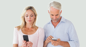 Largo couple using smartphones