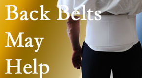 Largo back pain sufferers wearing back support belts are supported and reminded to move carefully while healing.