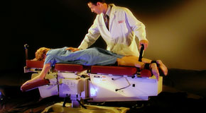 This is a picture of Cox Technic chiropratic spinal manipulation as performed at Hollstrom & Associates Inc.